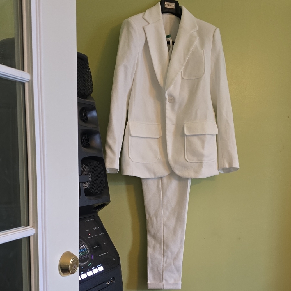White Women's Two-Piece Blazer and Trouser Suit.